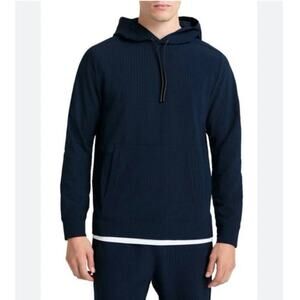 Brady by Tom Brady Grid Flex Performance Hoodie in navy size medium